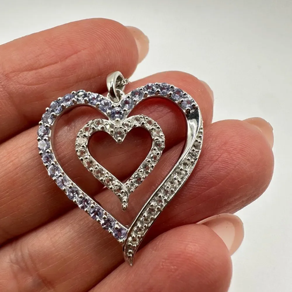 Genuine 1.5ctw tanzanite and‎ CZ accent heart necklace in sterling silver!